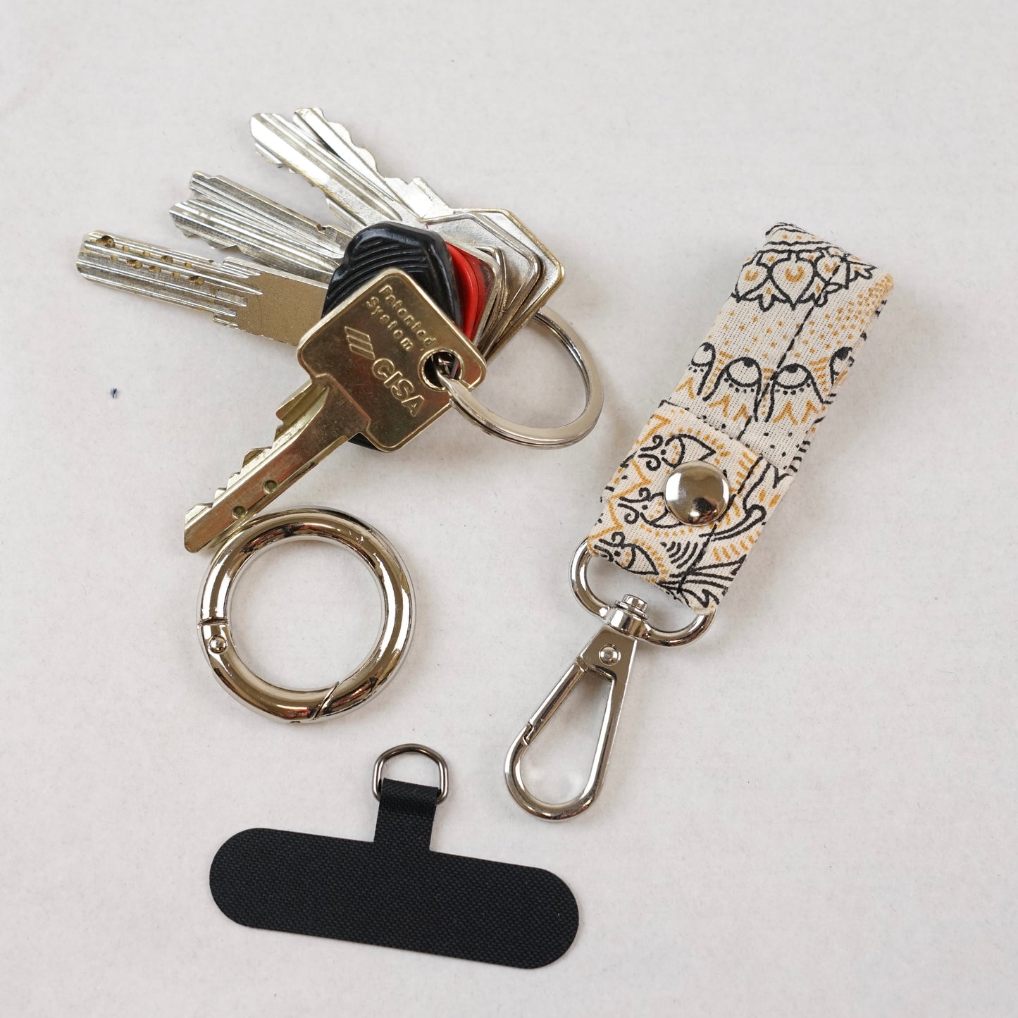 LACCIOLINO - Polsino per  telefono/ portachiavi